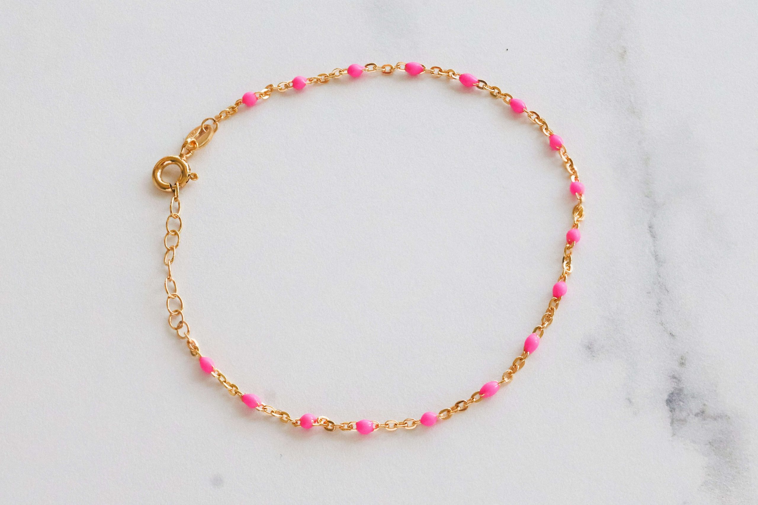 14k-gold-pink-beaded-bracelet-lightweight-elegant-summer-staple-adjustable-sizing.jpg