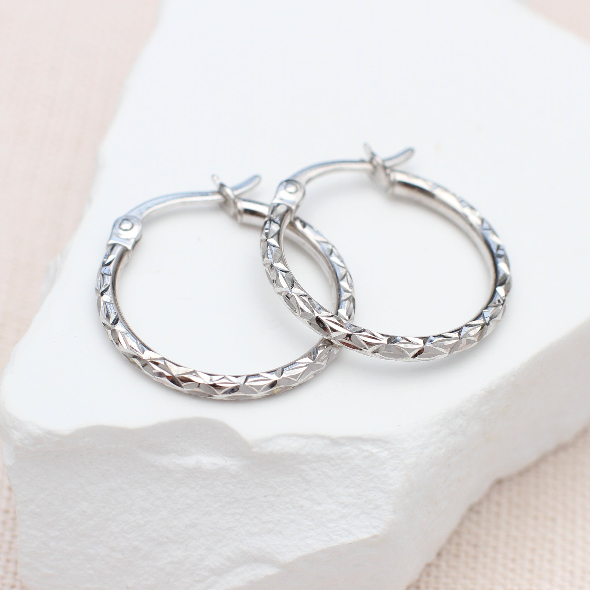 9ct-white-gold-diamond-cut-hoop-earrings.jpg