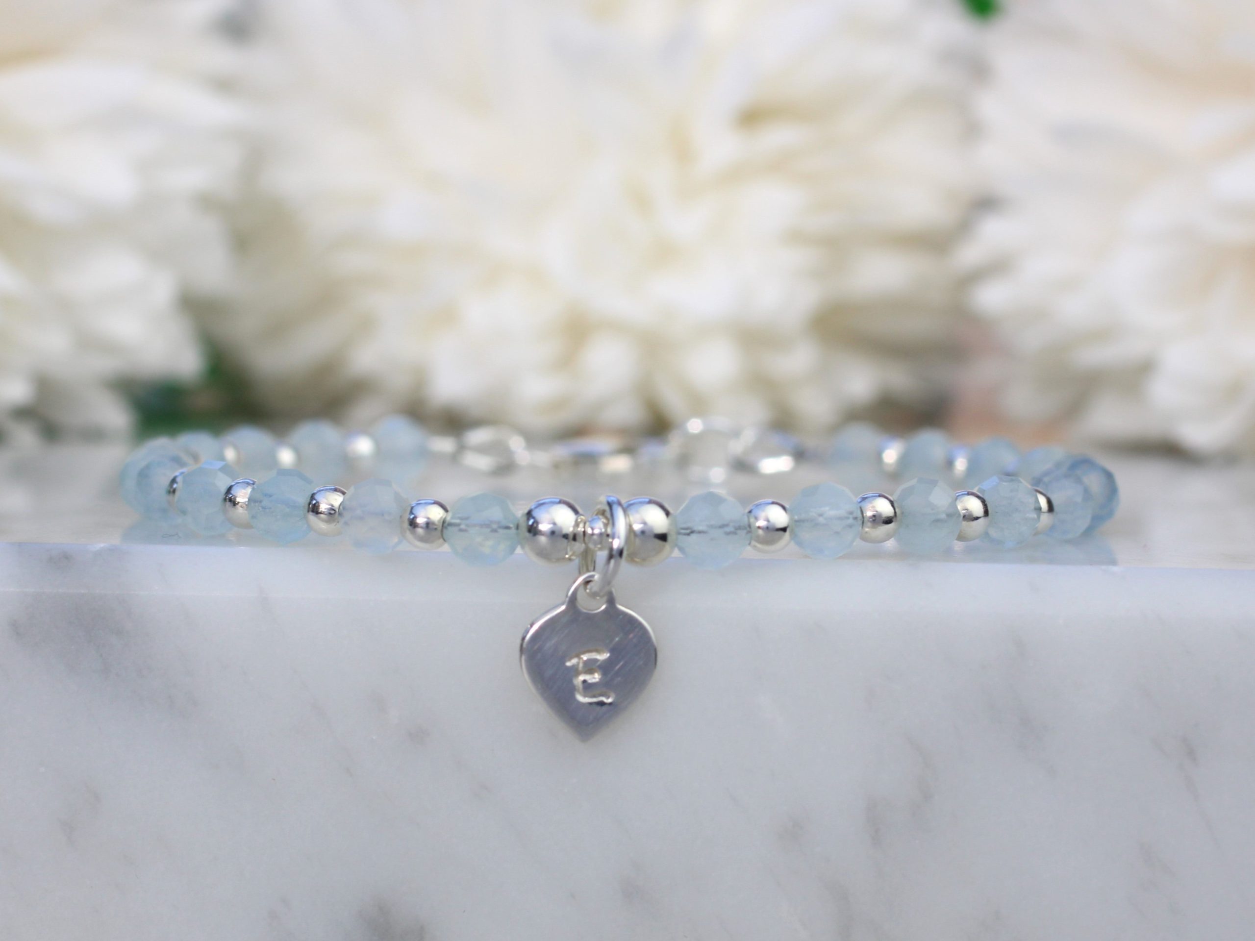aquamarineinitialbracelet.jpg