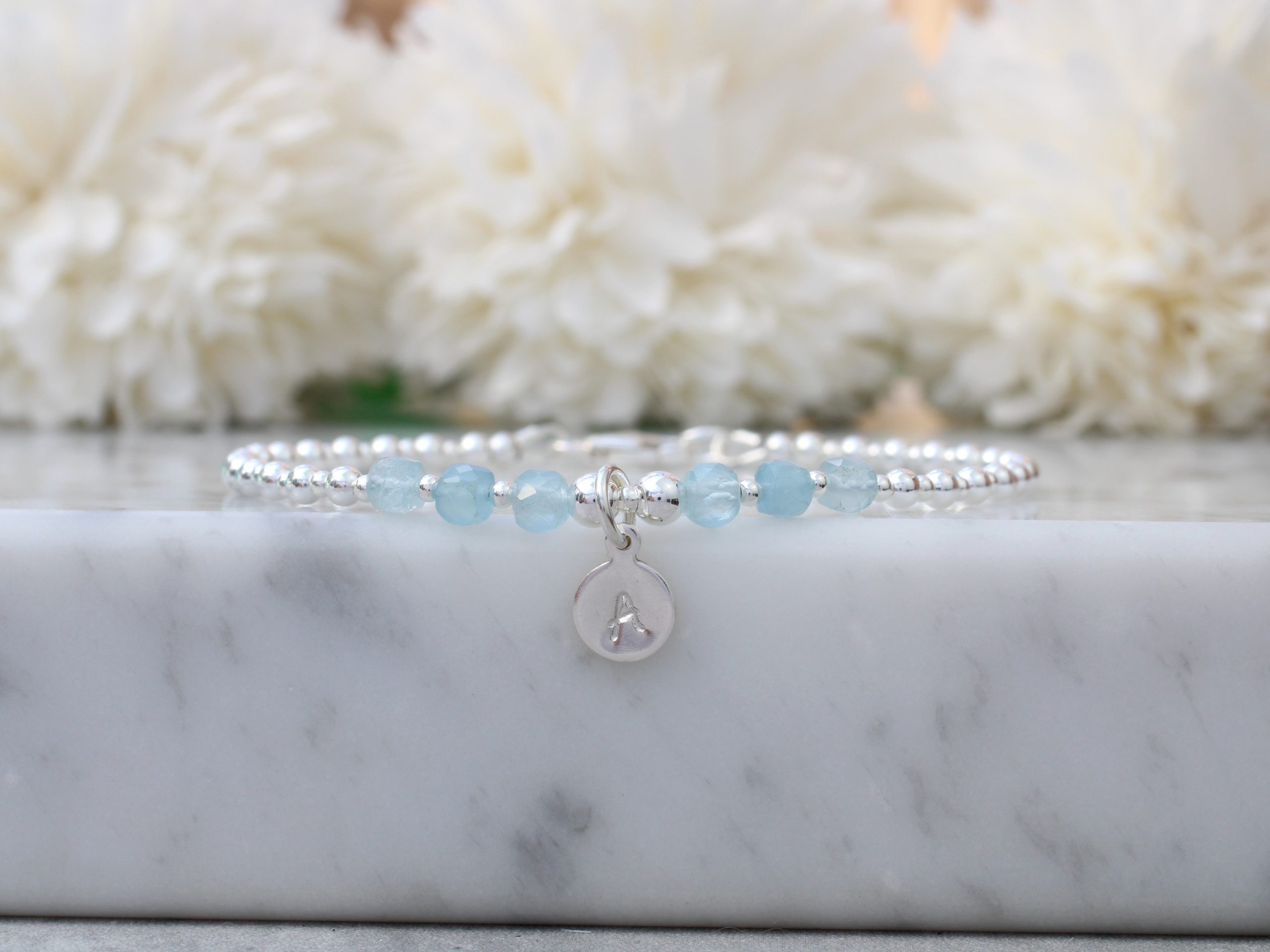 aquamarineinitialgemstonebracelet.jpg