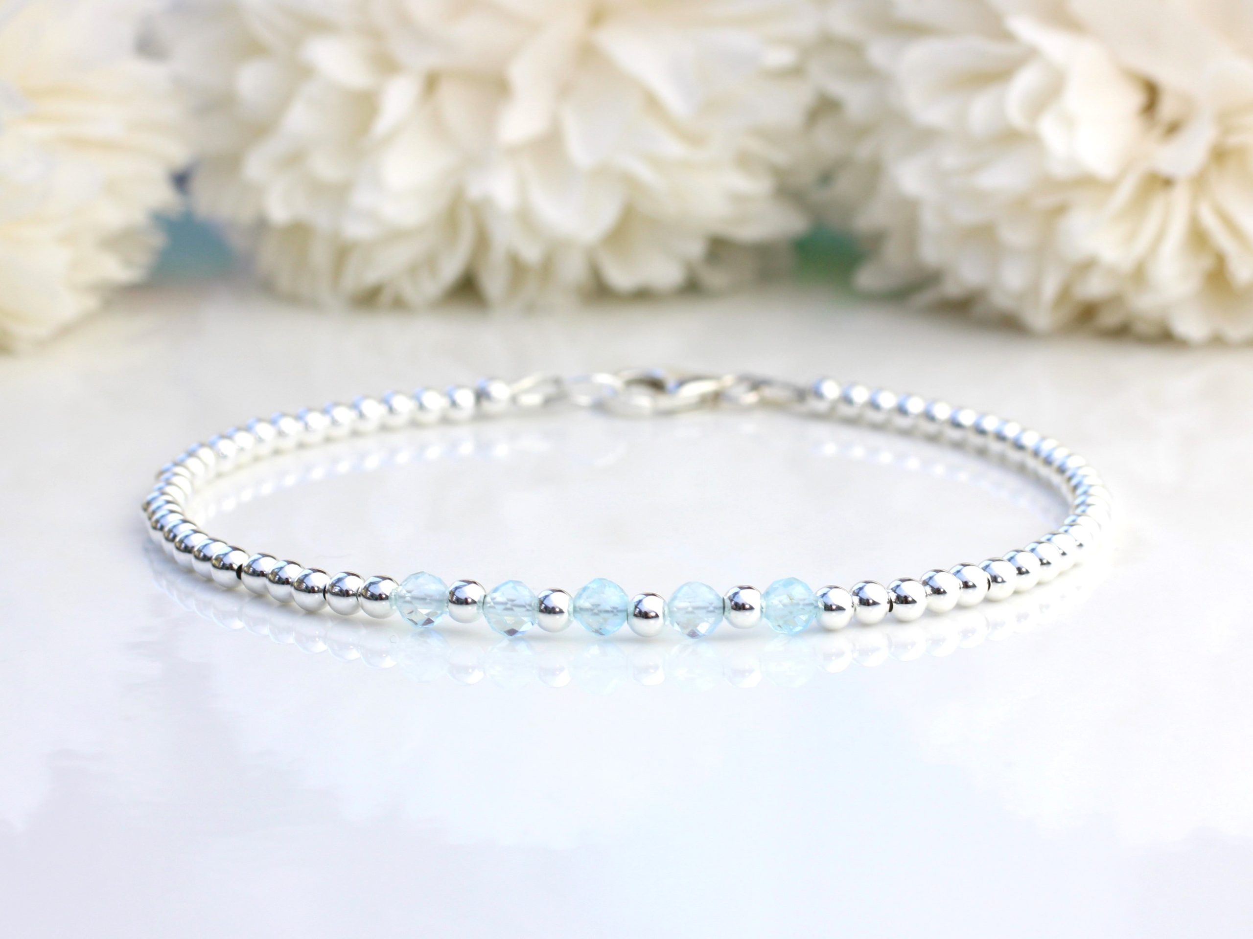 blue_topaz_milestone_bracelet.jpg